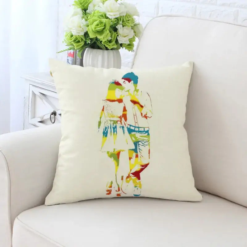 Cream-colored decorative pillowcase with vibrant cactus hand painting of two people kissing in rainbow hues for living room decorbites cactus hand