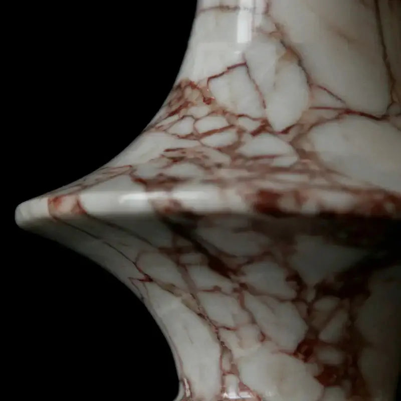 White ceramic marble vase with intricate calacatta red veining for decorbites calacatta red living room accent