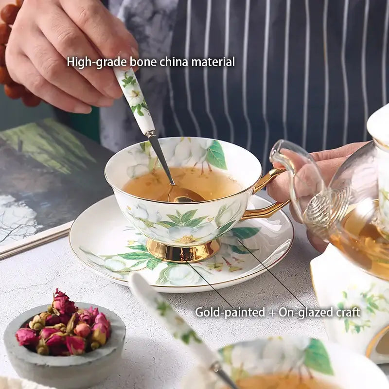 Elegant white bone china tea set featuring gold-painted camellia floral design by decorbites for refined dining