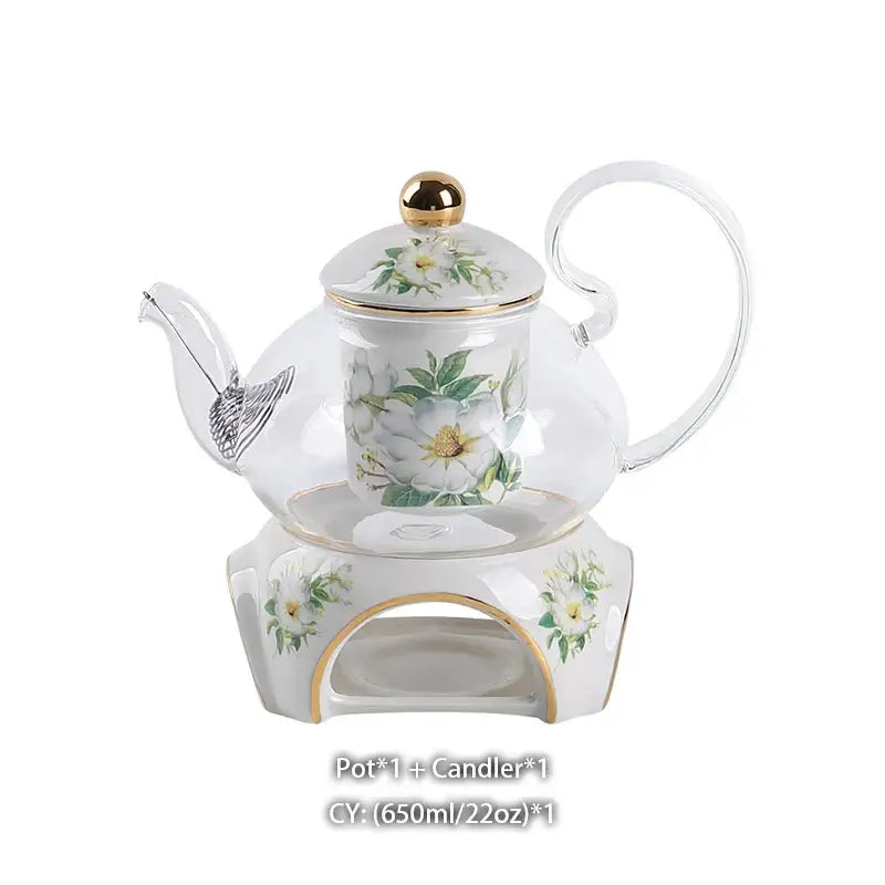 Clear glass Camellia floral tea set with white and gold porcelain teapot and matching ceramic candle warmer base
