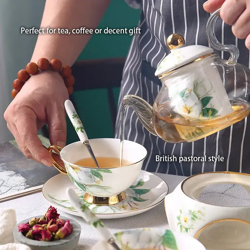 A delicate white porcelain camellia floral tea set with gold trim and matching saucer for elegant teaware decorbites camellia floral