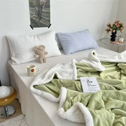 Soft mint green and white fleece blanket with plush texture in decorbites camellia jacquard lamb wool cozy quilt