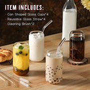 Clear glass drinking glasses set shaped like cans filled with various beverages topped with ice and tapioca pearls