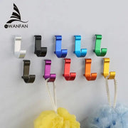 A set of candy color metal wall hooks in silver black blue green purple red orange and gold for bathroom towels and coats