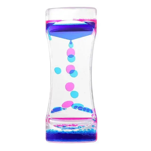 A clear glass candy liquid motion sand timer with blue and pink swirling liquids and colorful bubbles for living room decor