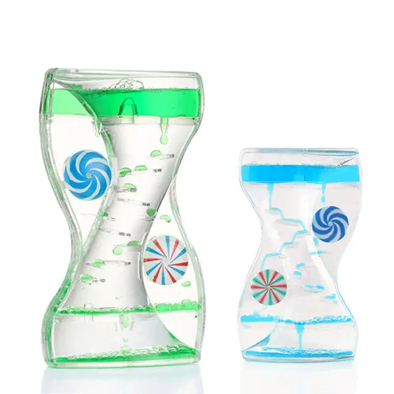 Clear glass liquid motion sand timer with swirling candy designs and vibrant blue and green liquids for living room decor