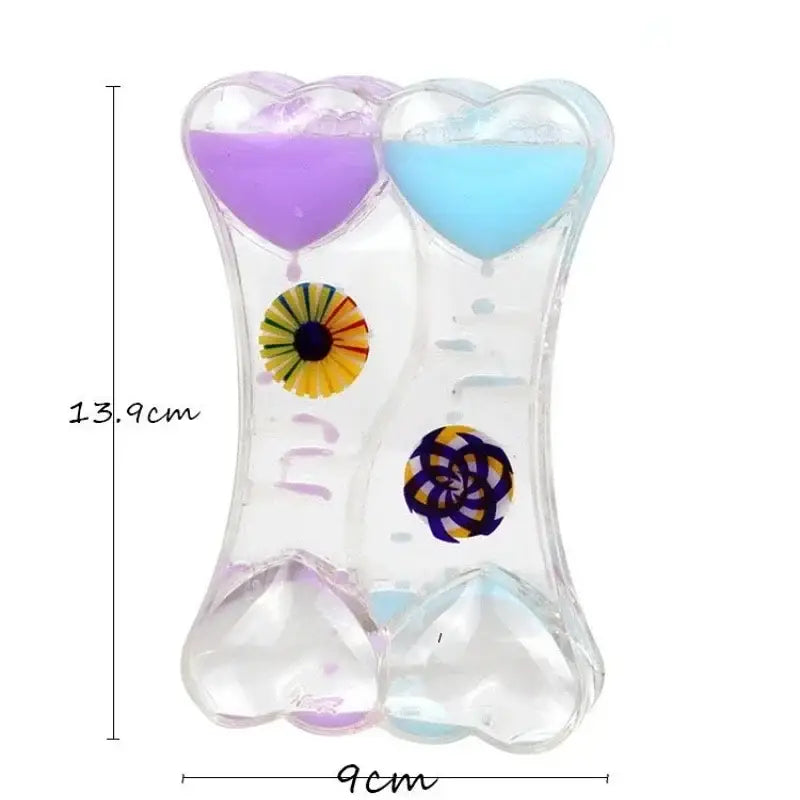 Clear plastic liquid motion sand timer with blue and purple heart compartments for living room decor