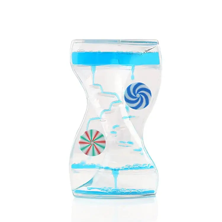 Clear glass hourglass liquid motion sand timer with blue viscous fluid and colorful candy-themed decorations for living room decor