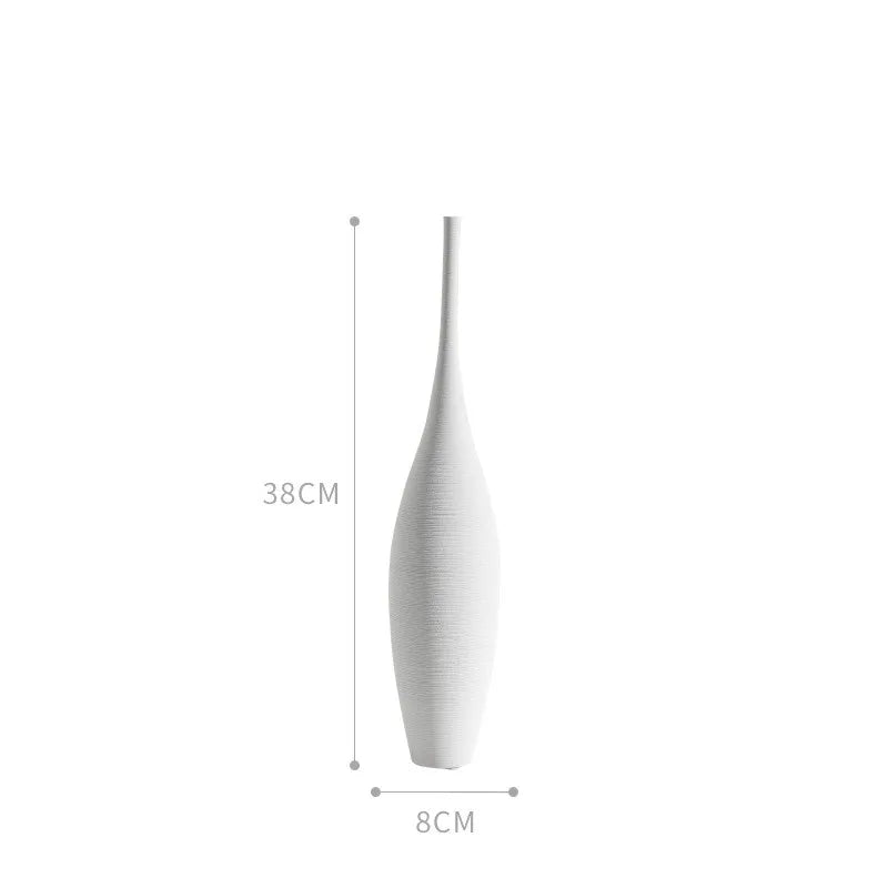 A sleek 38cm tall white ceramic capiron zen vase with a slender neck and textured surface for home decoration