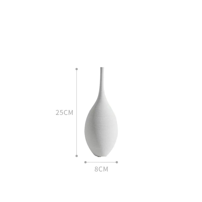 A sleek white ceramic CAPIRON zen vase 25cm tall with a slender neck and textured surface for home decoration