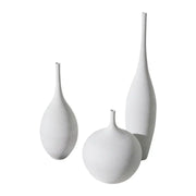 Set of three white ceramic vases with textured surfaces and slender necks for nordic home decoration by capiron