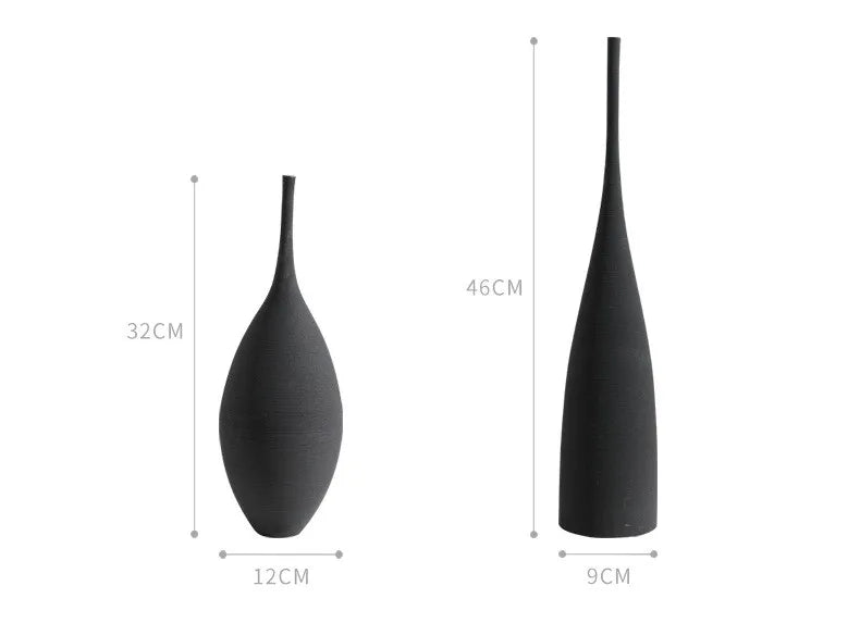 Two sleek black ceramic vases with a 32cm by 12cm and a 46cm by 9cm size from capiron zen collection for home decor
