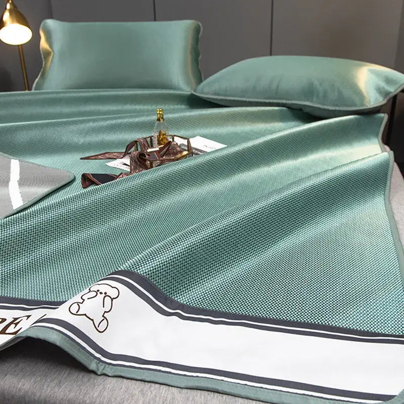 Teal carbon light cooling bed sheet with textured weave white border black stripes and cartoon bear for decorbites carbon light