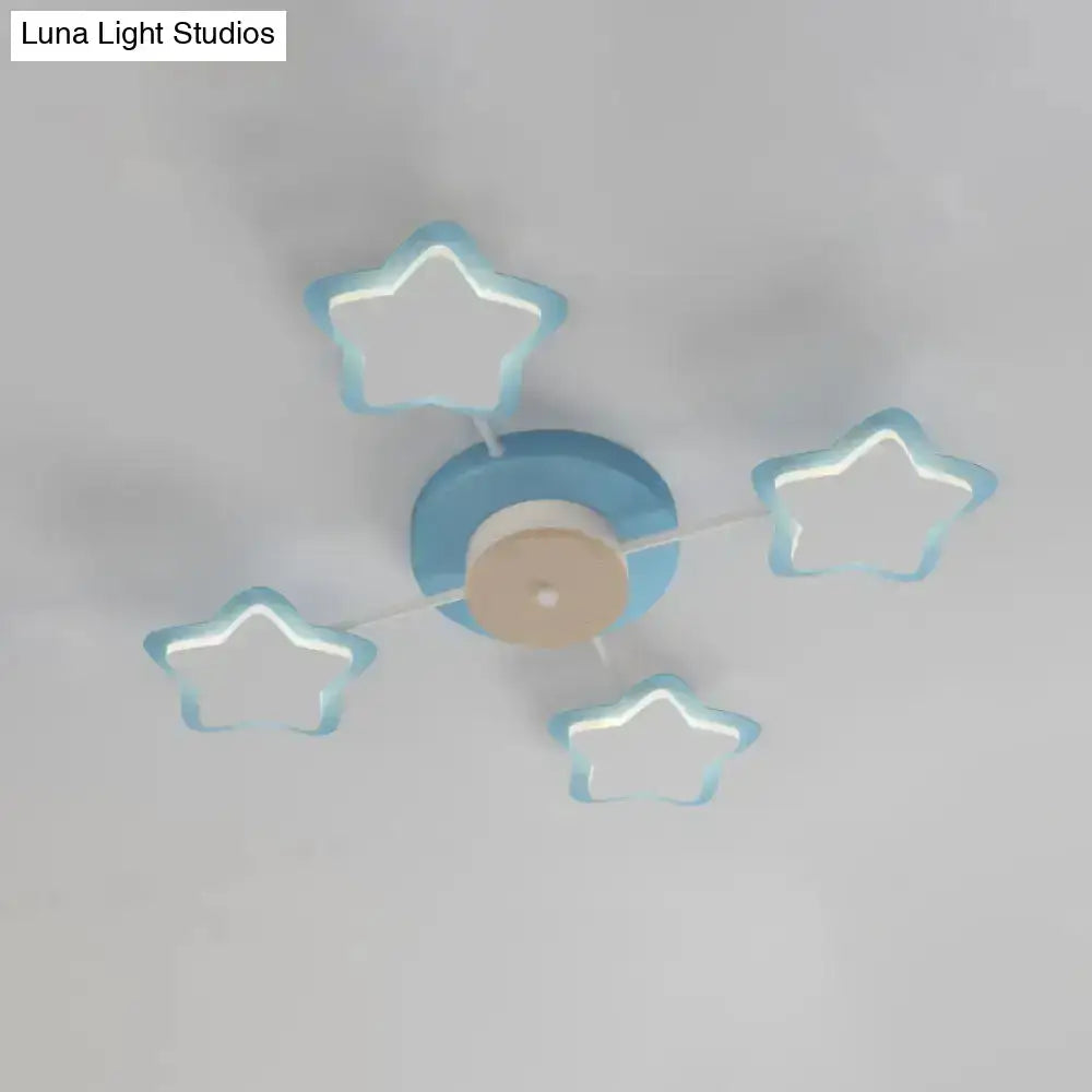 Blue star-shaped led flush mount ceiling light with glowing edges and central base for cartoon acrylic pink blue decor