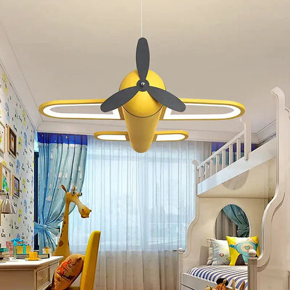 Yellow pendant light shaped like airplane with black propeller and illuminated wings for decorbites cartoon airplane kids bedroom