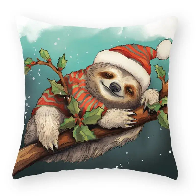 A cozy decorbites cartoon animal christmas pillow featuring a sloth in santa hat and sweater on holly branch decor