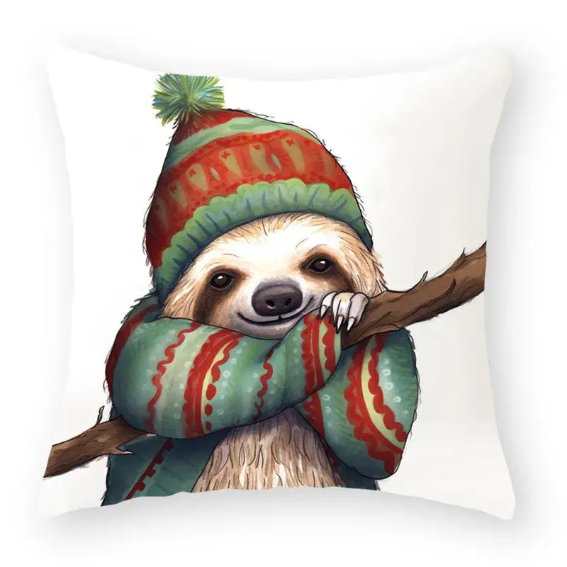 White throw pillow with decorbites cartoon animal christmas sloth wearing red and green knit hat and scarf animal christmas pillowcase