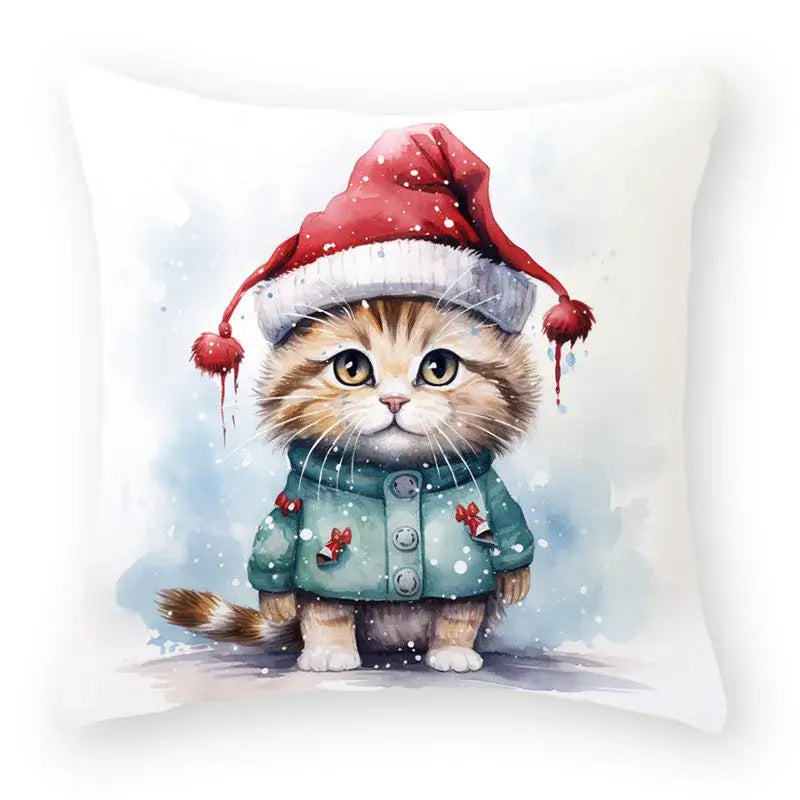 White throw pillow with a watercolor tabby kitten in a red santa hat and green coat for decorbites cartoon animal christmas decor