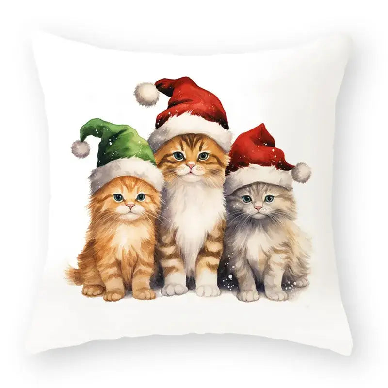 White throw pillow with watercolor cartoon animal christmas illustration of three kittens in festive santa hats for decorbites animal christmas pillowcase set