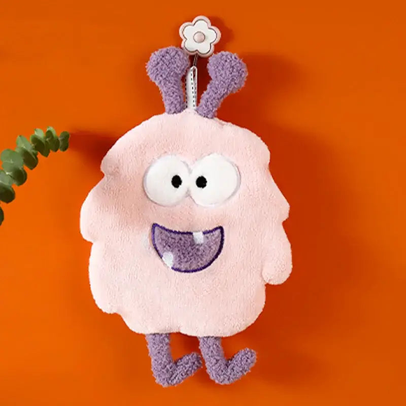 Pink plush cartoon animal coral velvet monster wallet with purple fuzzy ears and embroidered smiling face for hand towel set