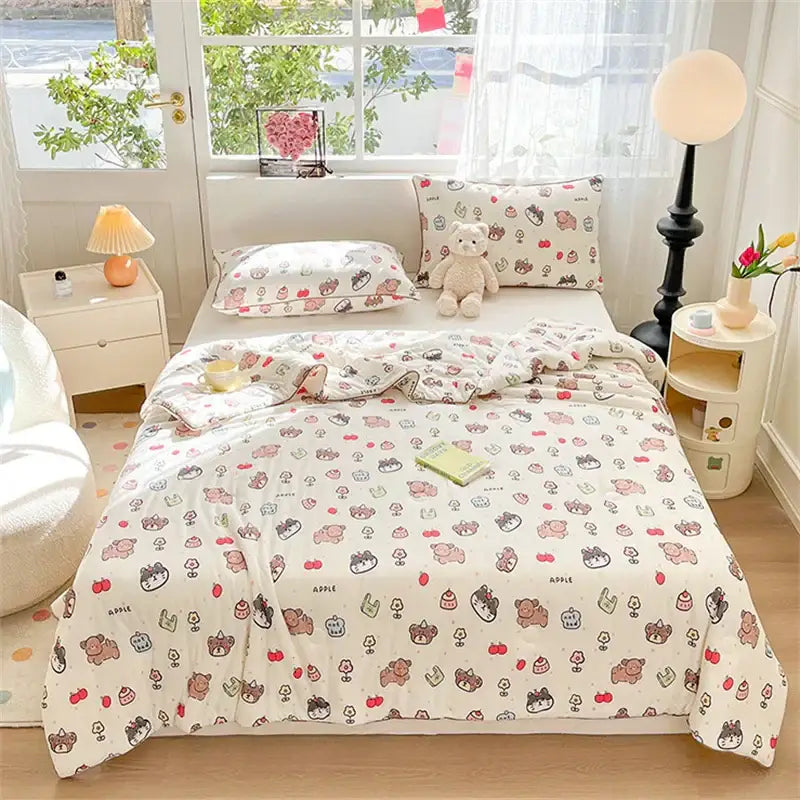 Cute cream kids summer quilt by decorbites featuring cartoon bears and colorful apples and cupcakes in soft knitted fabric