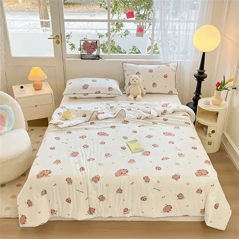 White kids summer quilt with cute pink and brown cartoon animal print soft knitted comforter by decorbites kids
