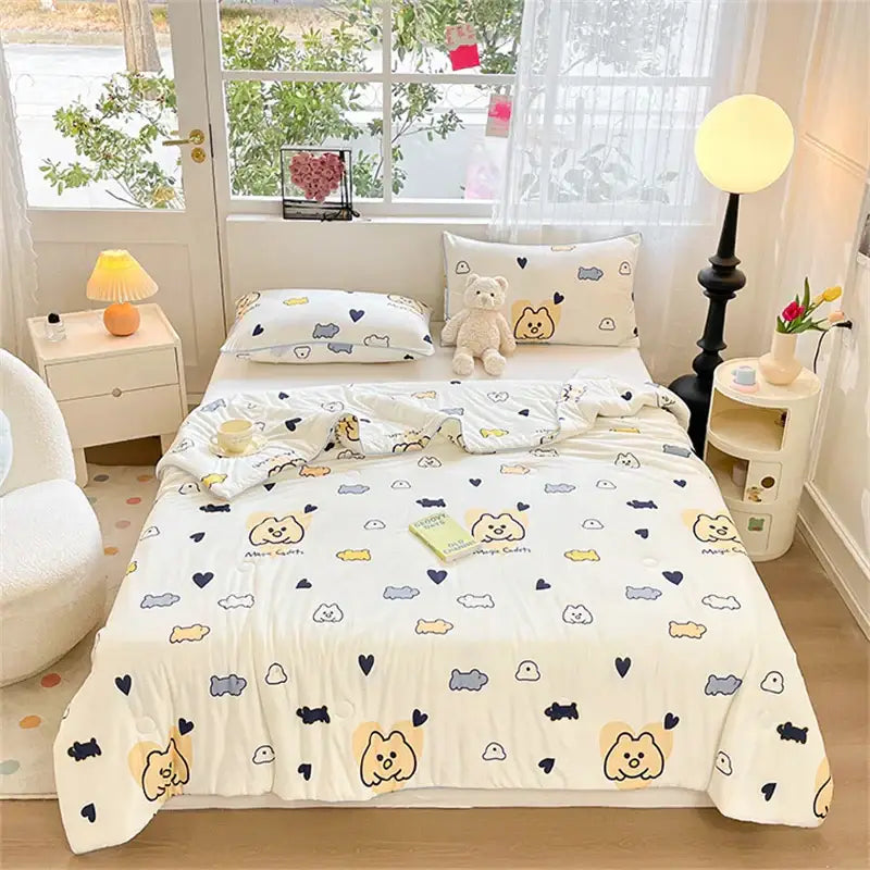 Cream-colored quilted kids summer quilt with plush texture and cartoon dog pattern for decorbites kids summer decor