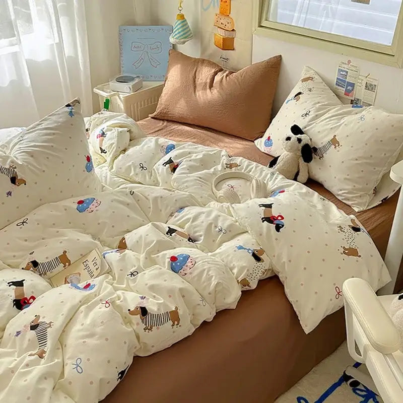 Cream satin quilt cover set featuring playful cartoon dachshunds and bows on a soft textured fabric