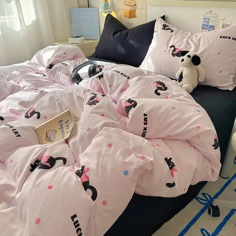 Pink satin quilt cover set with black cats wearing pink bows and polka dots for bedroom bedding