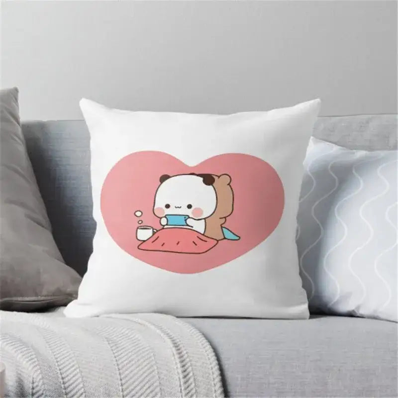 White and pink decorbites cartoon animal printed pillowcase featuring a panda holding a tablet and sipping from a mug
