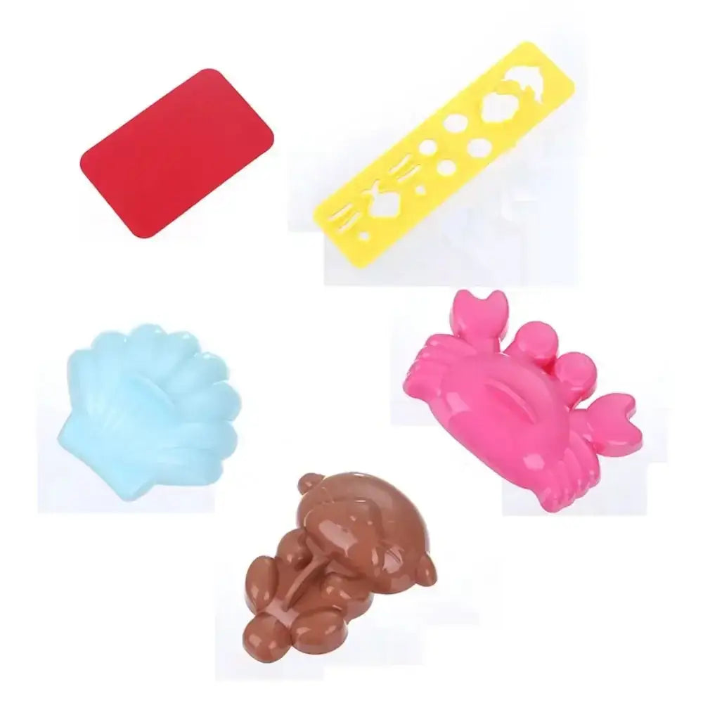 Pink plastic crab-shaped mold from cartoon animal sushi mold set for making rice ball shapes in the kitchen