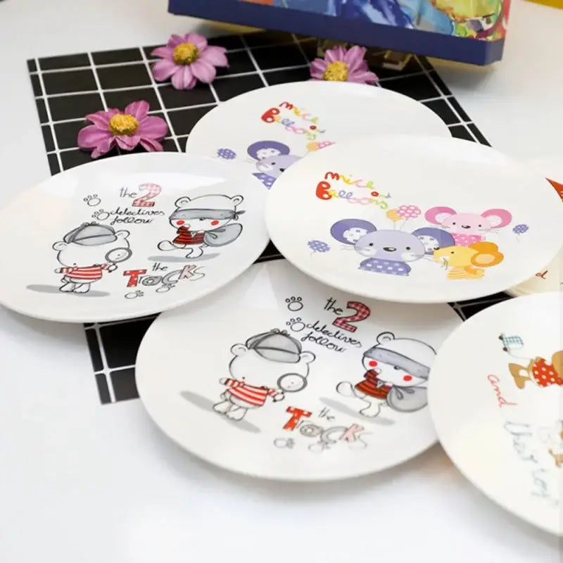 White ceramic bone snack plate set featuring colorful cartoon bears and mice with playful detective and balloon text decorbites bone snack