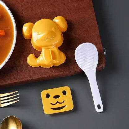 Yellow plastic dog-shaped rice mold from decorbites cartoon animals mold set for cartoon animals sushi and sandwich making