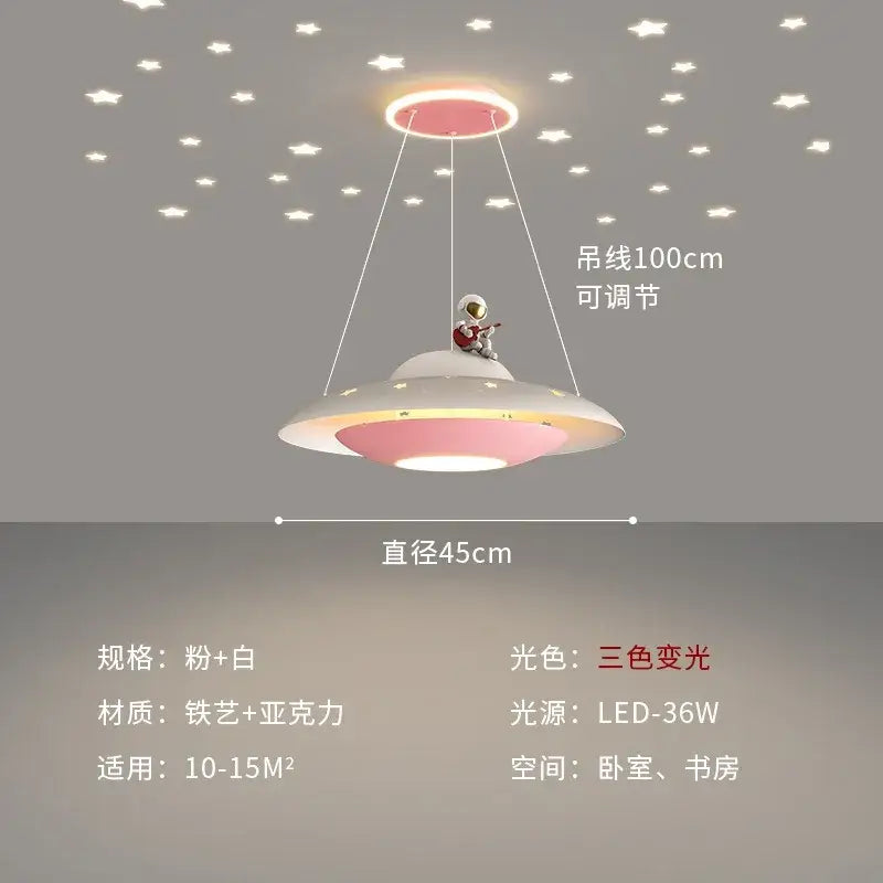 Pink and white ufo-shaped pendant light with a small astronaut figurine playing guitar decorbites cartoon astronaut chandelier