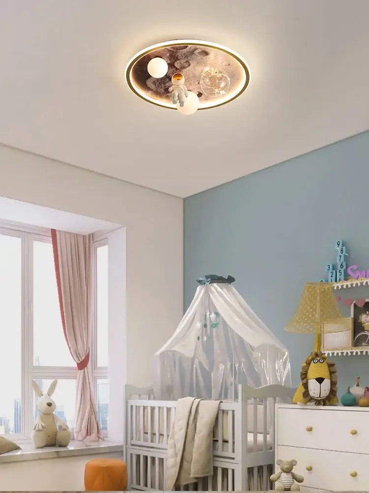 Cartoon astronaut ceiling lamp with space-themed design featuring planets stars in warm ambient lighting for kids room decorbites cartoon astronaut