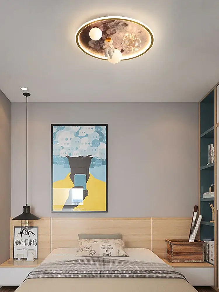 Circular ceiling lamp with cartoon astronaut, glowing orbs, and celestial patterns for kids bedroom decorbites cartoon astronaut