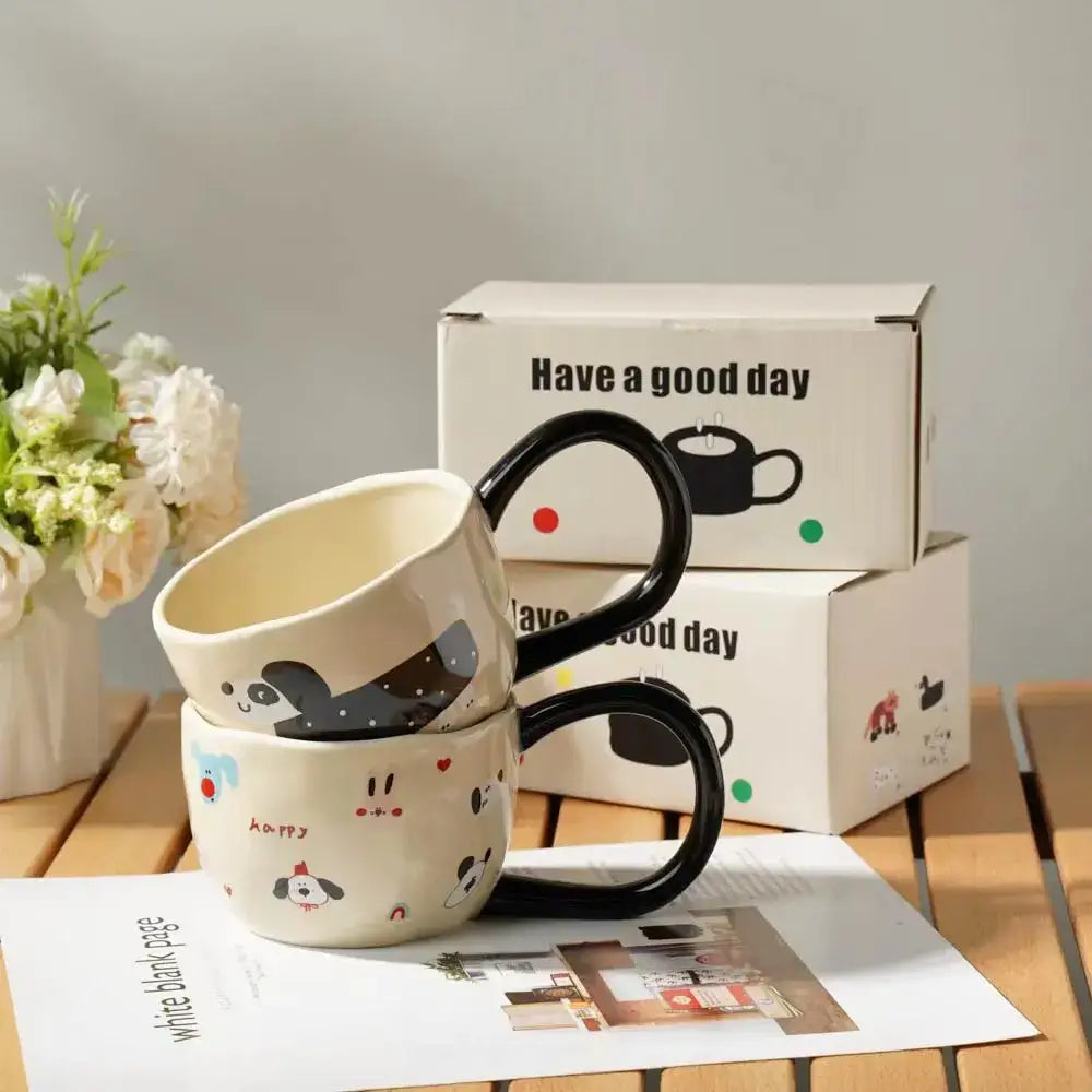 Cream-colored ceramic cartoon big ear cup mug with black handles featuring playful animal designs for kitchen decorbites cartoon big use