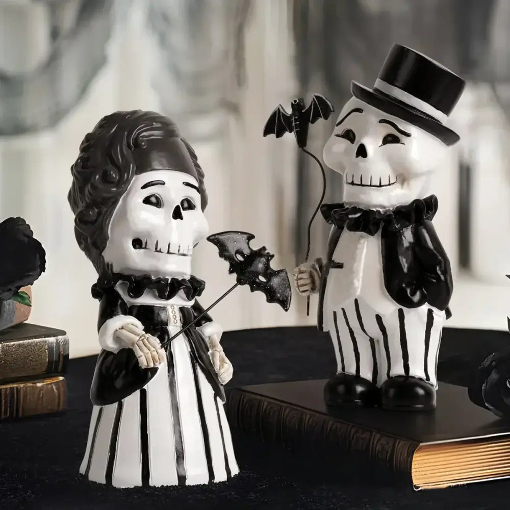 Black and white skeleton gentleman bat couple figurines dressed in formal attire for living room decor