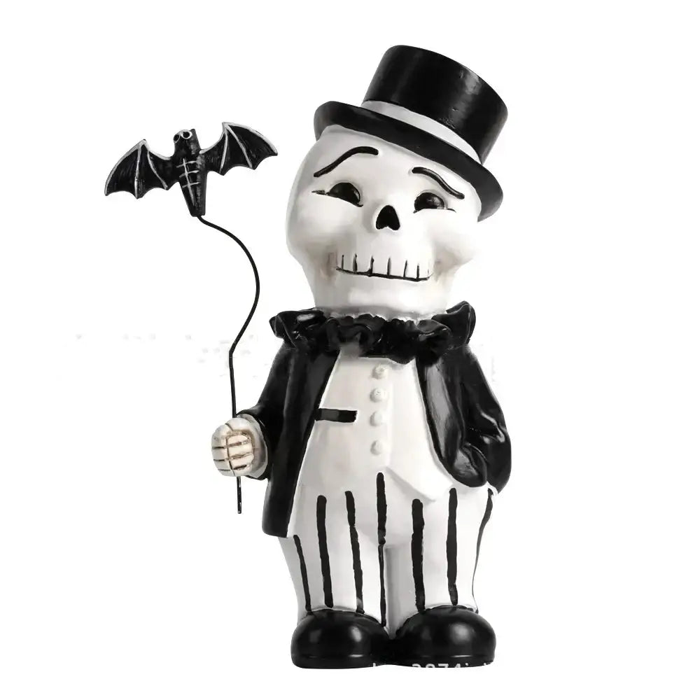 Cartoon black and white skeleton gentleman bat figurine in tuxedo with top hat holding bat string for living room decor
