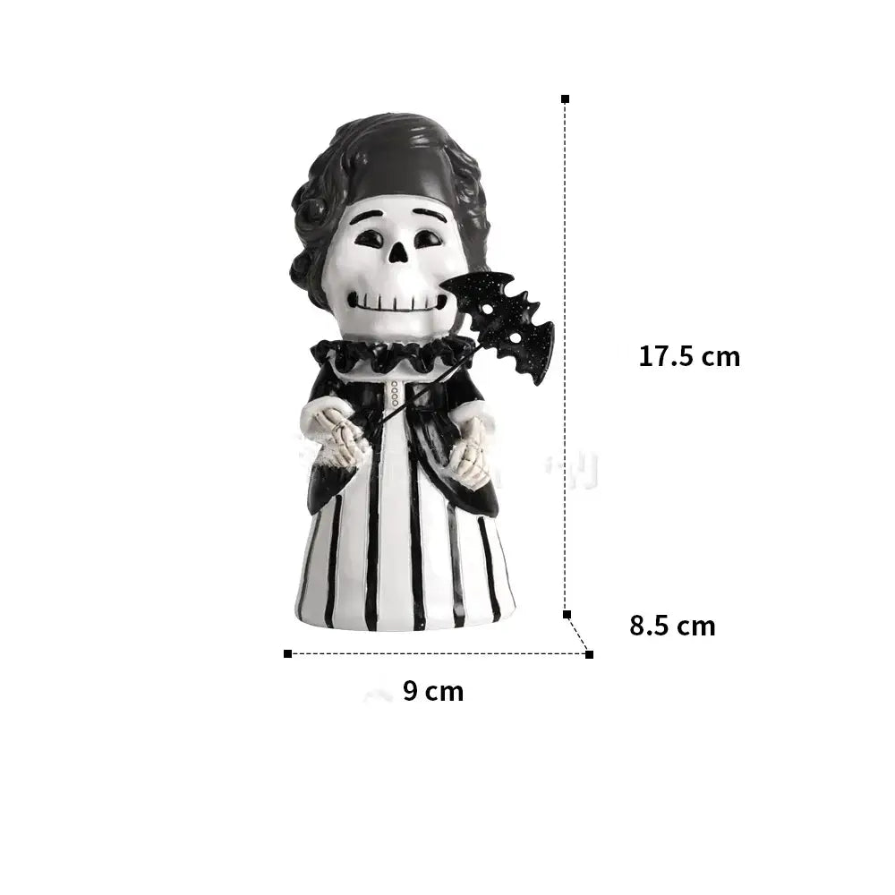 Black and white ceramic skeleton gentleman bat figurine in striped gown holding decorative axe for living room decor
