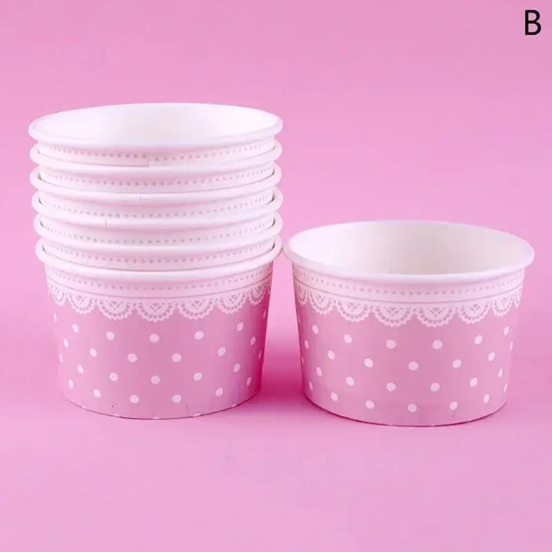 Pink paper cup with white polka dots and lace trim from decorbites cartoon paper cups collection for dining room use