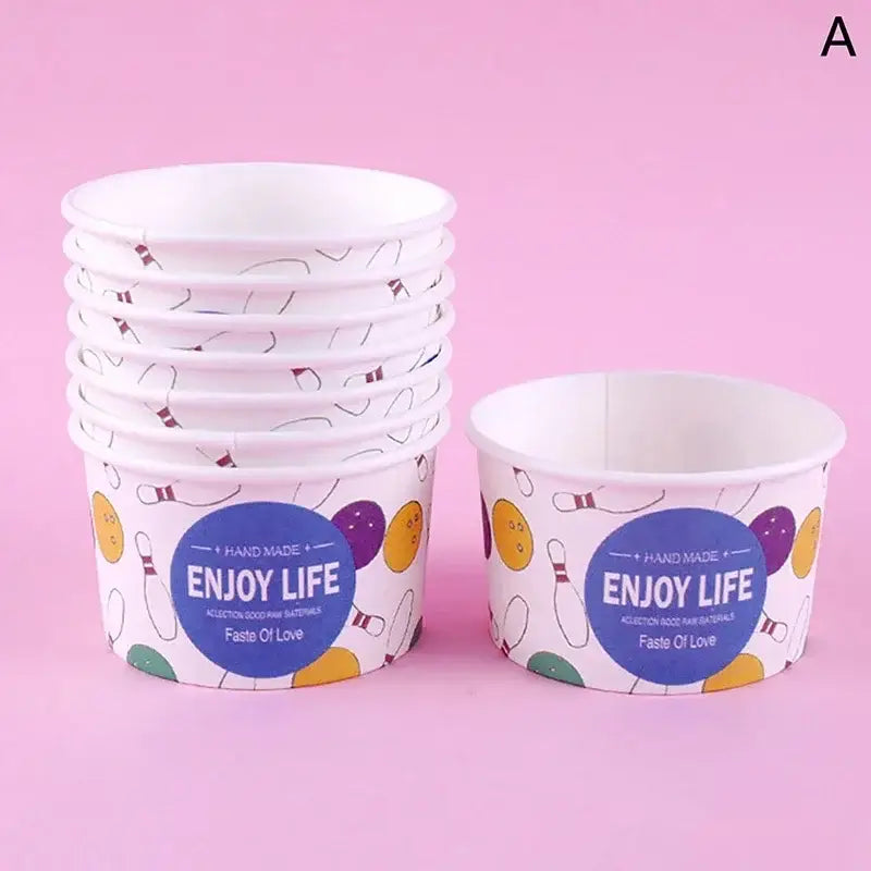 White paper cups with colorful bowling-themed decorbites cartoon paper design and blue enjoy life label for dessert use