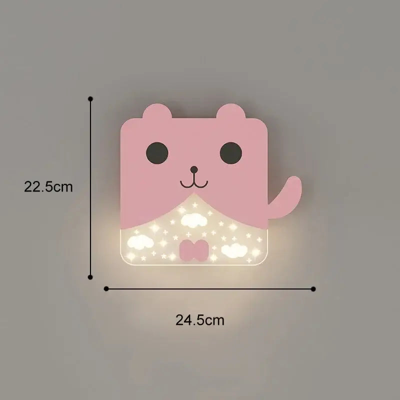 Pink cartoon bear-shaped wall lamp with glowing lower half and cloud star patterns suitable for bedroom use