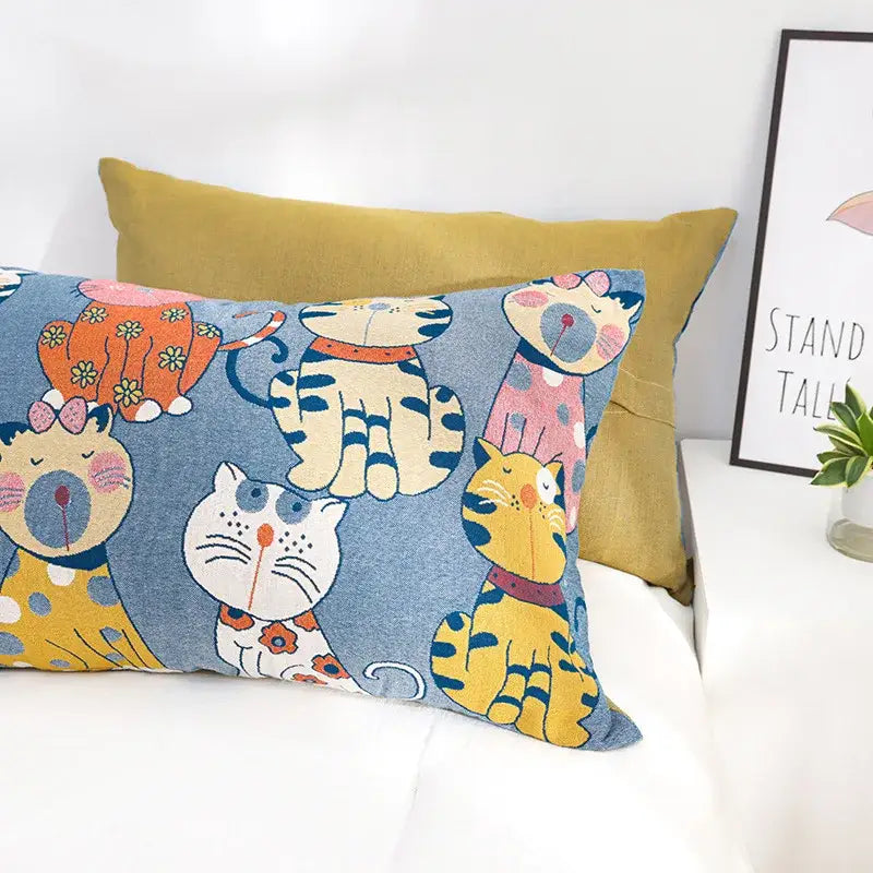 Blue woven cotton pillow with colorful cartoon cats pattern from decorbites cartoon boho bedspread collection
