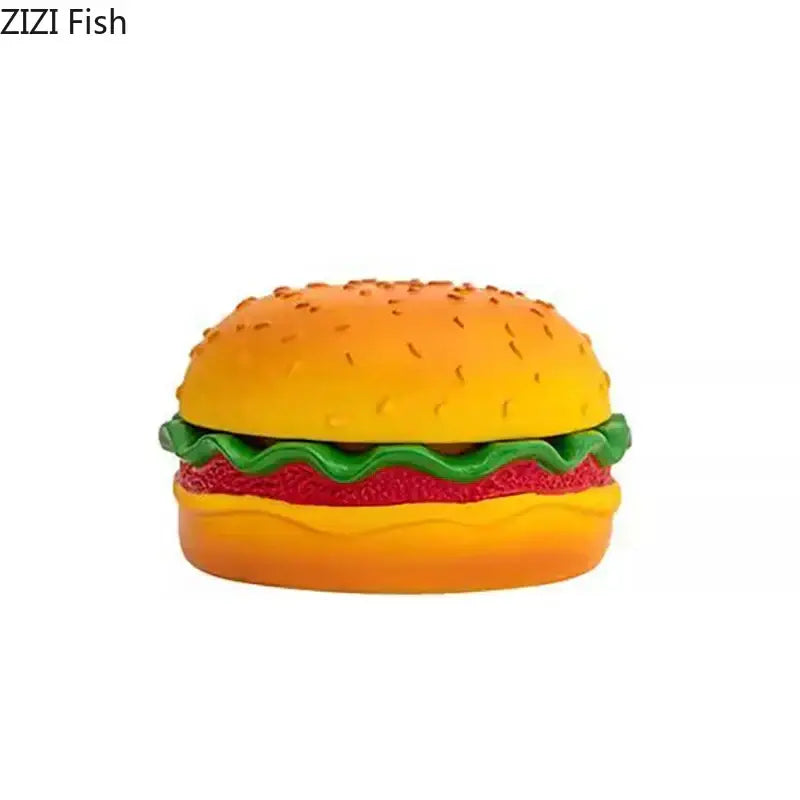 Vibrant yellow and green resin cartoon burger ashtray shaped like a glossy plastic hamburger for office decor