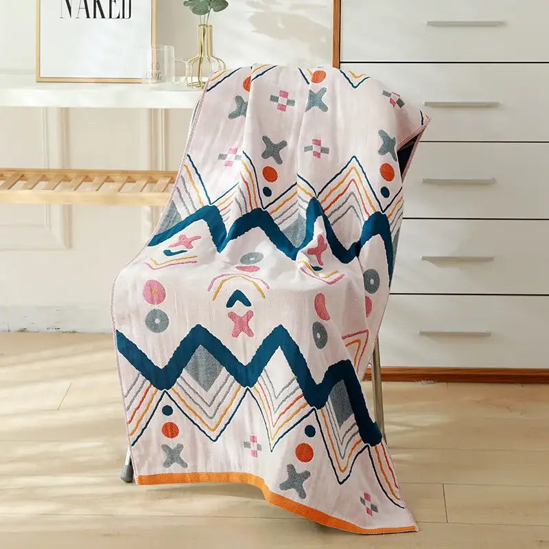 Cartoon cat and rabbit cotton gauze bath towel with vibrant geometric pattern in teal and orange for bedroom and nursery decorbites cotton gauze bath