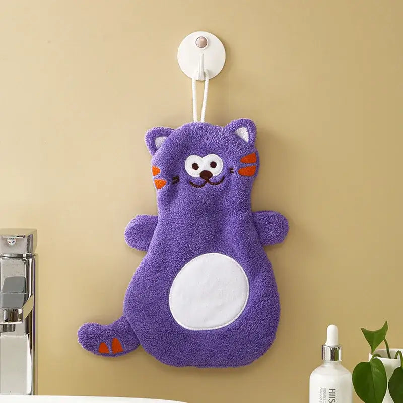 Purple plush coral velvet hand towel shaped like a cartoon cat with white belly patch and orange accents decorbites cartoon cat