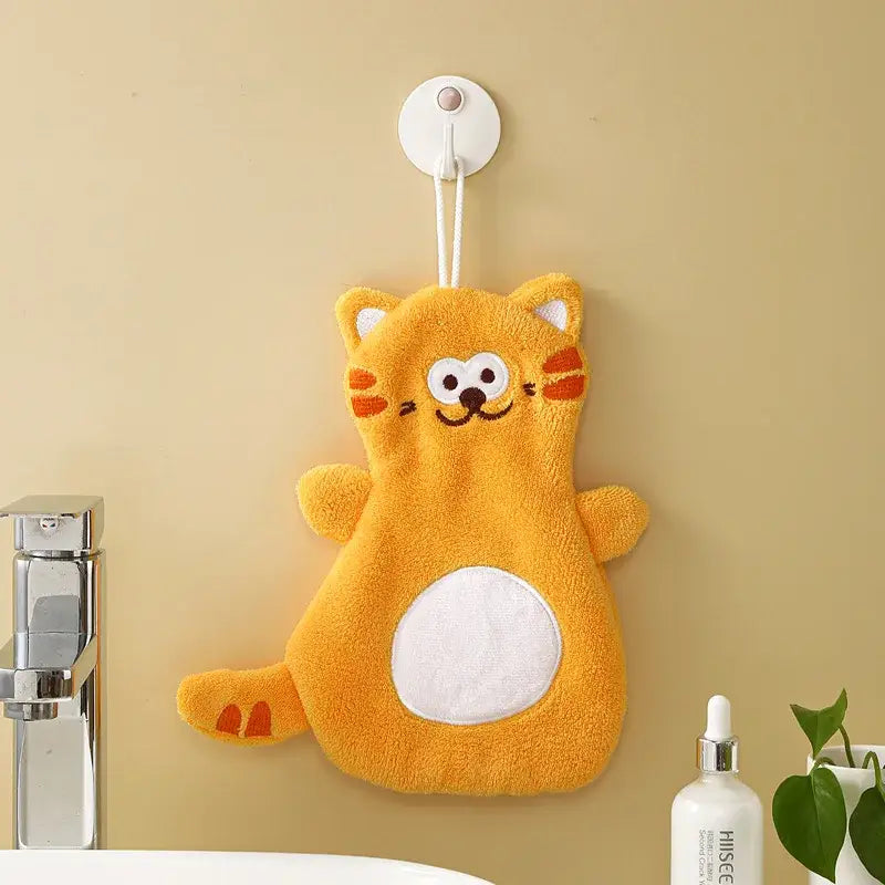 Orange plush hand towel shaped like a cartoon cat with white embroidered belly for decorbites cartoon cat coral bathroom decor