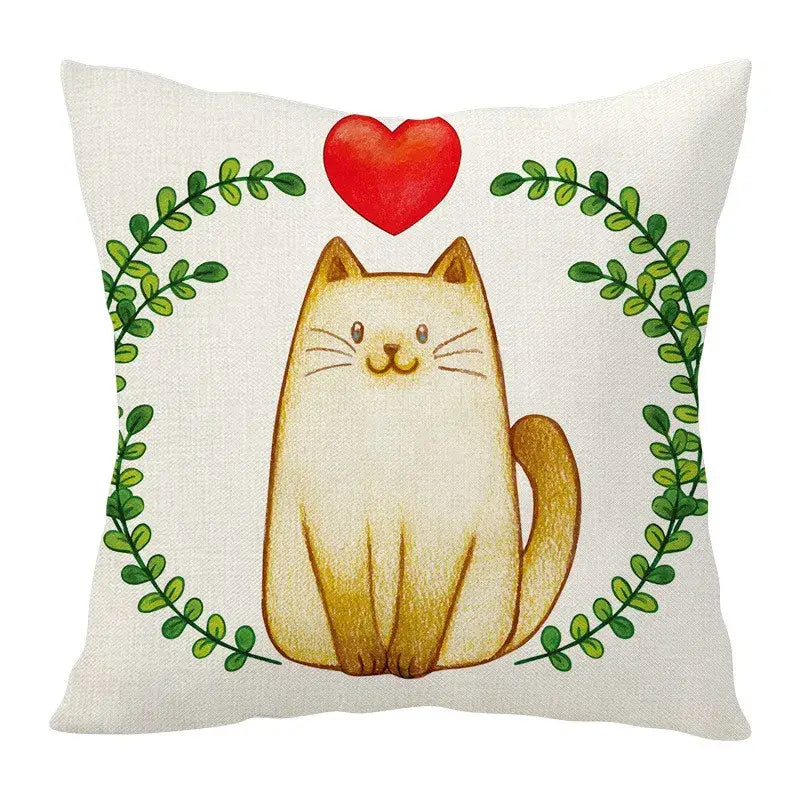 Cream-colored cartoon cat linen cushion with red heart and green leafy wreath by decorbites for living room decor