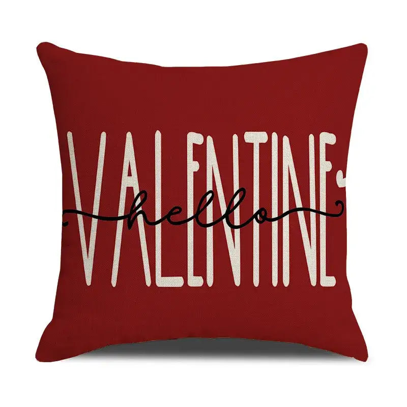 Red throw pillow with valentine in white block letters and hello in black script cartoon cat linen decorbites cartoon cat
